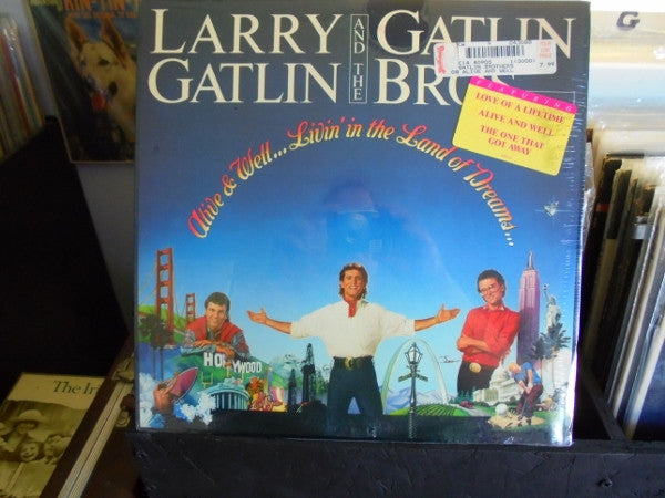 Larry Gatlin & The Gatlin Brothers - Alive & Well...Livin' In The Land Of Dreams